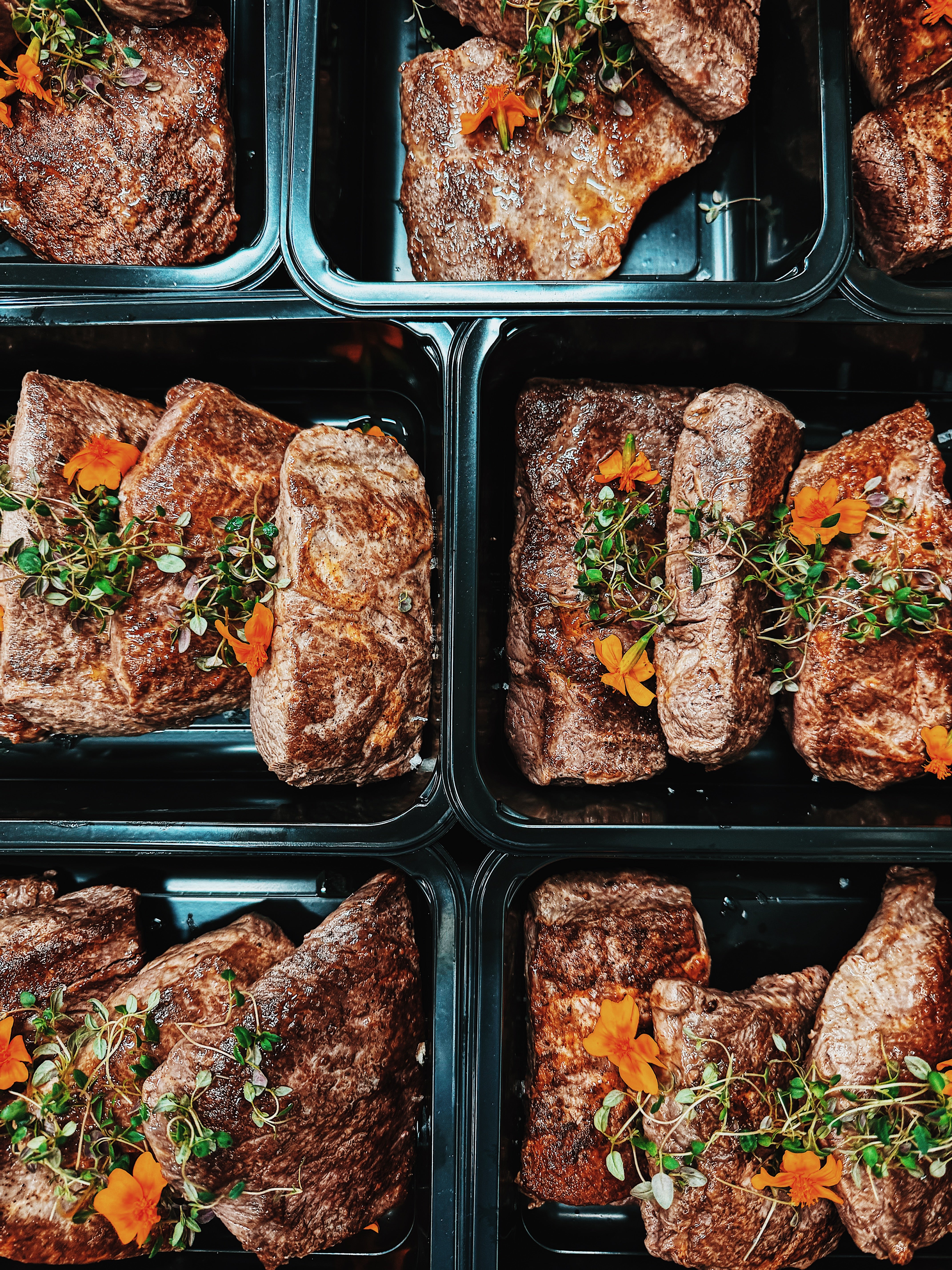 Freshly prepared grass-fed beef meal prep containers by The Gourmet Animal