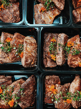 Freshly prepared grass-fed beef meal prep containers by The Gourmet Animal